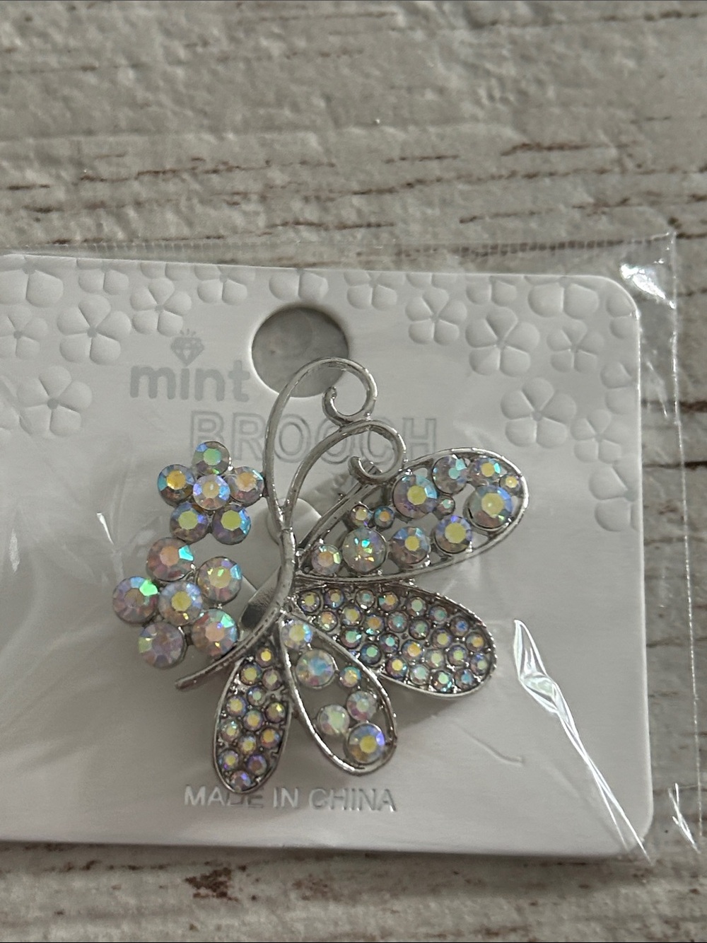 5/$25 Mint Crystal Butterfly Brooch in Iridescent White